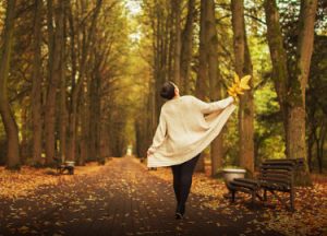 POTS Treatment - Results - Woman Walking in Park in Fall