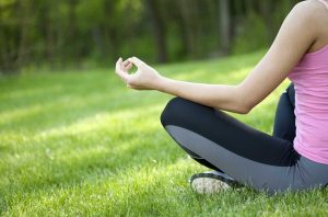 Woman in Lotus Pose - POTS Treatment Feeling Better